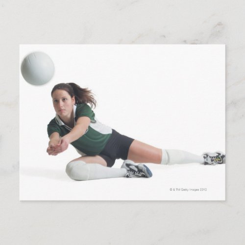 a young caucasian female volleyball player in a postcard