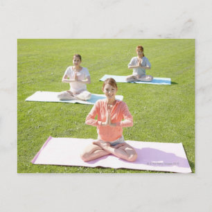 A young woman doing yoga postcard
