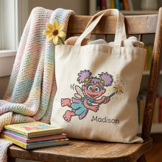 Abby Cadabby Flying Tote Bag (Generated image of tote bag on chair)