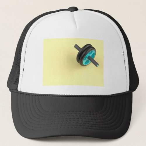 Abdominal toning wheel trucker hat