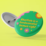 Abortion is a Fundamental Human Right Feminist Button<br><div class="desc">Abortion is a fundamental human right written in retro yellow font on a funky hippie style button for a pro choice feminist. Show off your fun spirit with this cute green button with pretty flowers while also standing up for women's rights and the pro-choice movement.</div>