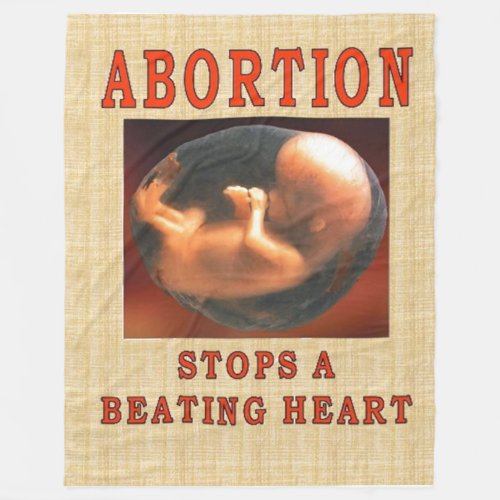 ABORTION STOPS A BEATING HEART FLEECE BLANKET