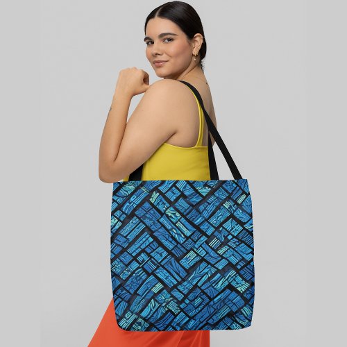 Abstract blue and black geometric pattern tote bag