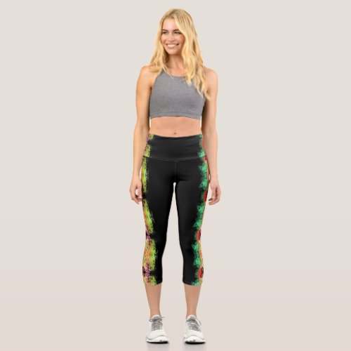 abstract color splash floral design on black capri leggings