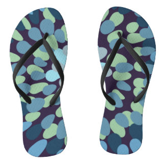 Abstract design in muted greens and gray flip flops