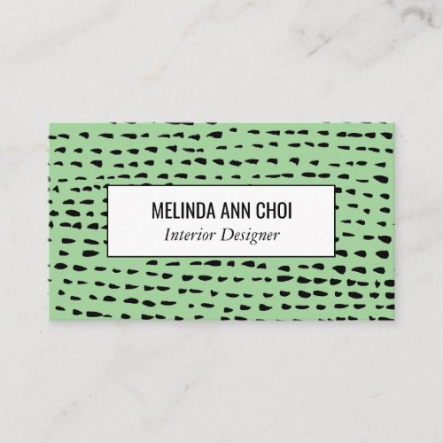 Abstract dots black on green business card