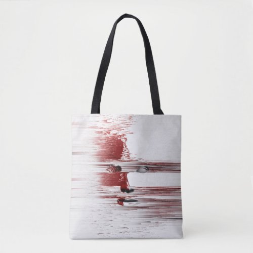 Abstract face in red tote bag