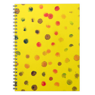 Abstract hand drawn image with multicolor dots on notebook