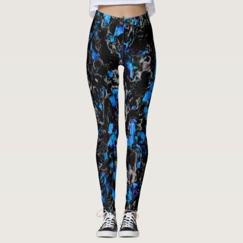 Abstract looking bat wings over stained turquoise  leggings