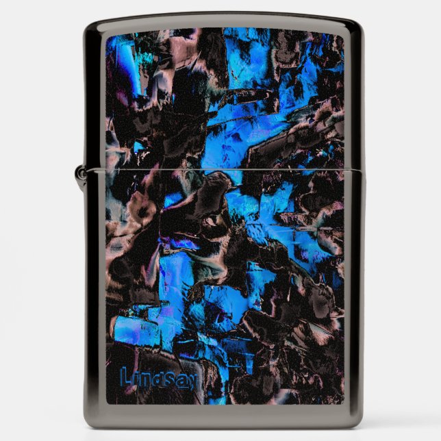 Abstract looking redish black rock on stained blue zippo lighter (Front)