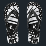 Abstract Monarch Butterfly Wing Monogram  Flip Flops<br><div class="desc">Abstract Monarch butterfly wing with monogram decorates the flip flops in black, and white. Customize it by modifying the color of the sandals. Your color will replace the larger white wing areas and pair with black and smaller irregular white dots framing the wing. Additionally, personalize the initial. Like this, it...</div>