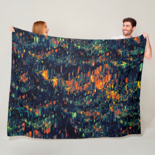 Abstract mosaic of displaced campfire on greenish fleece blanket
