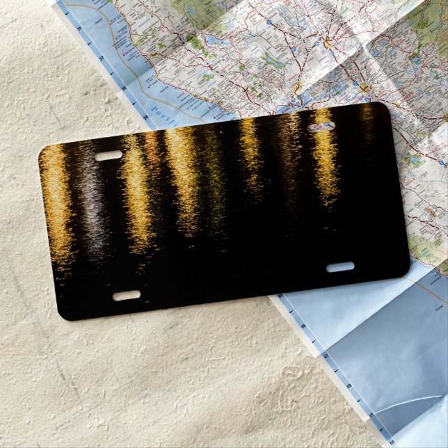 Abstract night lights sea shiny gold black license plate (In Situ)