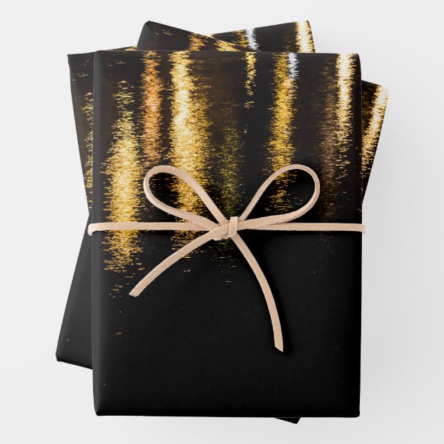 Abstract night lights sea shiny gold black wrapping paper sheets (In situ)