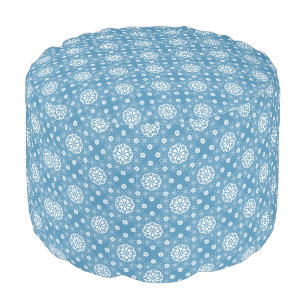 Abstract openwork floral pattern in light blue col pouf