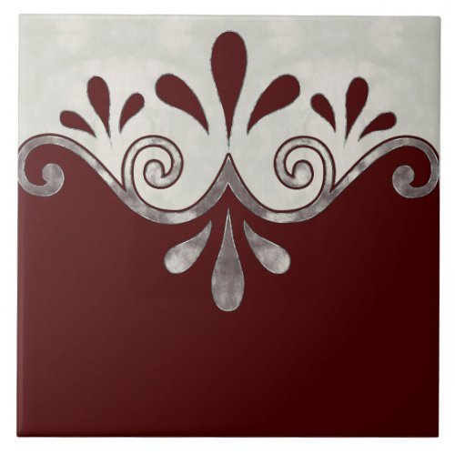 Abstract ornamental shape in burgundy and silver ceramic tile