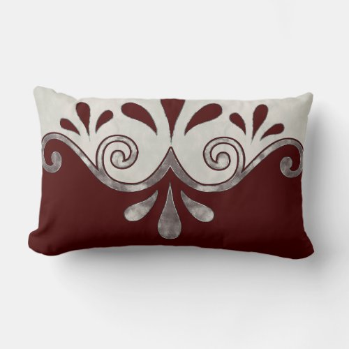 Abstract ornamental shape in burgundy and silver lumbar pillow