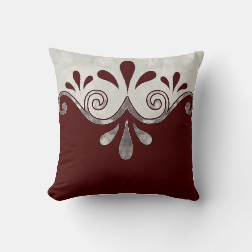 Abstract ornamental shape in burgundy and silver throw pillow