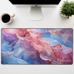 Abstract Pink Purple And Gold Personalized Desk Mat<br><div class="desc">Elevate your workspace with this personalized desk mat featuring a captivating abstract design in vibrant pink and soothing purple hues, accented with luxurious gold foil. The dynamic shapes and contrasting colors create a visually stunning and inspiring backdrop for your work. Make it truly yours by adding your name or a...</div>