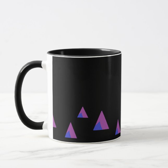 Abstract purple triangles on black mug (Left)