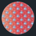 Abstract red and blue Christmas snowflakes Classic Round Sticker<br><div class="desc">Abstract blue and white Christmas snowflakes pattern on a red background. Need more? Check out other holiday designs at my store! Cheers! :)</div>