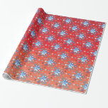 Abstract red and blue Christmas snowflakes Wrapping Paper<br><div class="desc">Abstract blue and white Christmas snowflakes pattern on a red background. Need more? Check out other holiday designs at my store! Cheers! :)</div>