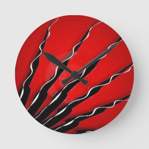 Abstract red tendrils round clock