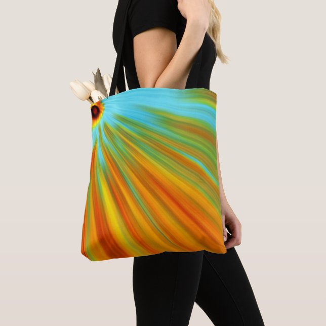 Abstract  red yellow orange green stripes on blue tote bag (Close Up)