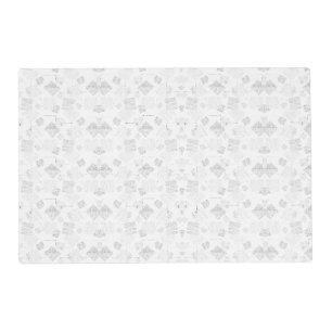 Abstract repeating pattern of stylized shapes in l placemat