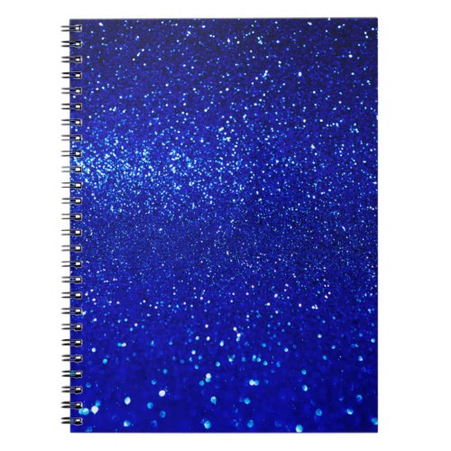 Abstract shiny blue glitter background notebook