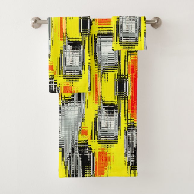 Abstract squares formed from scratches over yellow bath towel set (Insitu)