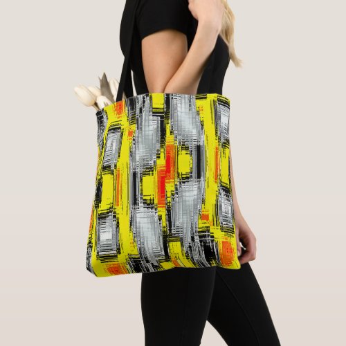 Abstract squares formed from scratches over yellow tote bag
