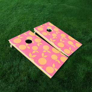 Abstract tangerine pink and yellow pattern cornhole set