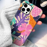 Abstract Tropical Jungle Custom Name iPhone 16 Pro Max Case<br><div class="desc">Embrace the vibrant hues of paradise with this Tropical Floral phone case. This lively design features a lush arrangement of tropical flowers and foliage in a captivating blend of pink, purple, and orange tones. Personalize it with your name for a touch of individual style. Perfect for those who appreciate bold...</div>