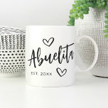 Abuelita Year Established Grandma Coffee Mug<br><div class="desc">Create a sweet keepsake for grandma with this simple design that features "Abuelita" in hand sketched script lettering accented with hearts. Personalize with the year she became a grandmother for a cute Mother's Day or pregnancy announcement gift.</div>