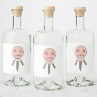 Accursed voodoo doll liquor bottle label