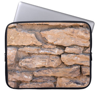Acient brick wall. Grunge brick wall background. B Laptop Sleeve