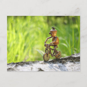 Acorn elf riding the bike postcard