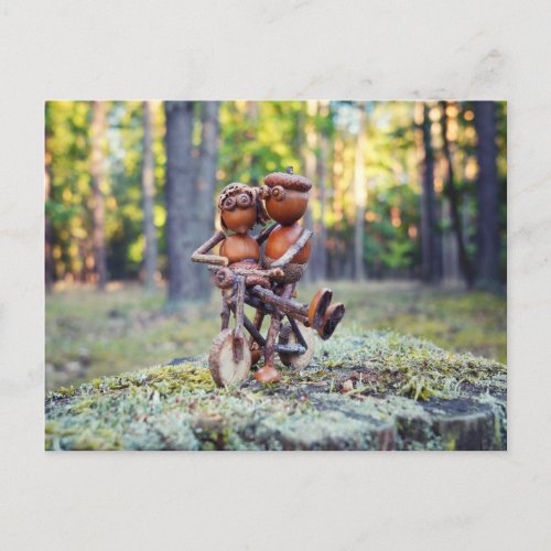 Acorn elf with his girl on the bicycle postcard