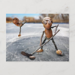 Acorn elves playing on the ice winter postcard