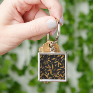Acorns and oak leaves on black keychain