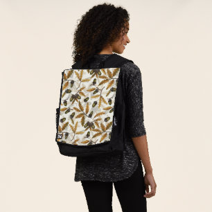 Acorns and oak leaves on off white backpack