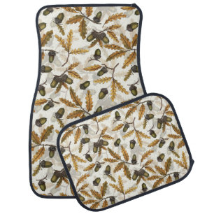 Acorns and oak leaves on off white car floor mat