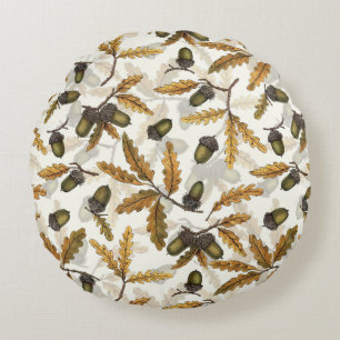 Acorns and oak leaves on off white round pillow
