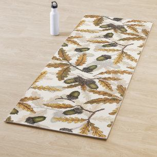 Acorns and oak leaves on off white yoga mat