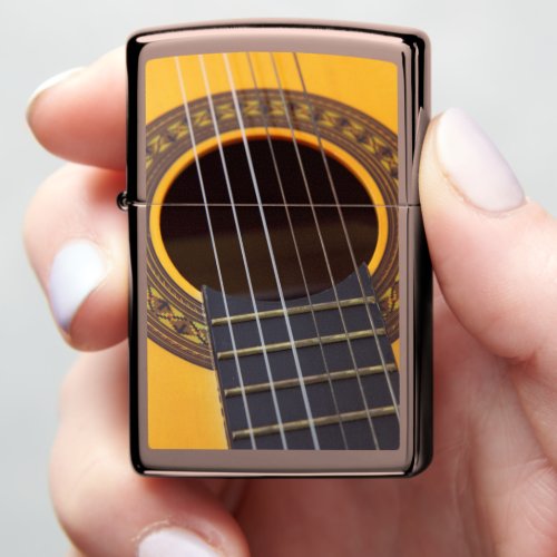 Acoustic Guitar with the six string Zippo Lighter