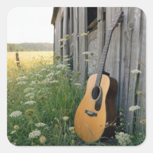 Acoustical Guitar Leaning on a Country Barn Square Sticker