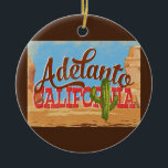 Adelanto California Cartoon Desert Retro Travel Ceramic Ornament<br><div class="desc">Adelanto California neo vintage travel design in funny cartoon retro style featuring the desert,  a cactus and rocks. Blue,  brown and red with green cactus.</div>