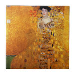 Adele Bloch-Bauer's Portrait by Gustav Klimt Tile<br><div class="desc">Gustav Klimt - Adele Bloch-Bauer's Portrait 1907. Previous location of this painting: formerly Österreichische Galerie in the Belvedere palace in Vienna. This painting was sold for $135 million to Ronald S. Lauder, in 2006, who brought it to his Neue Galerie in New York City. At that time it was the...</div>