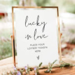 ADELLA Minimalist Lucky in Love Sign<br><div class="desc">This lucky in love sign features an edgy handwritten font and modern minimalist design. Easily change the colors and edit *most* wording to meet the needs of your occasion. This sign is perfect for your contemporary, minimalist, or modern wedding, bridal shower, or couples shower. Pair with additional items from the...</div>